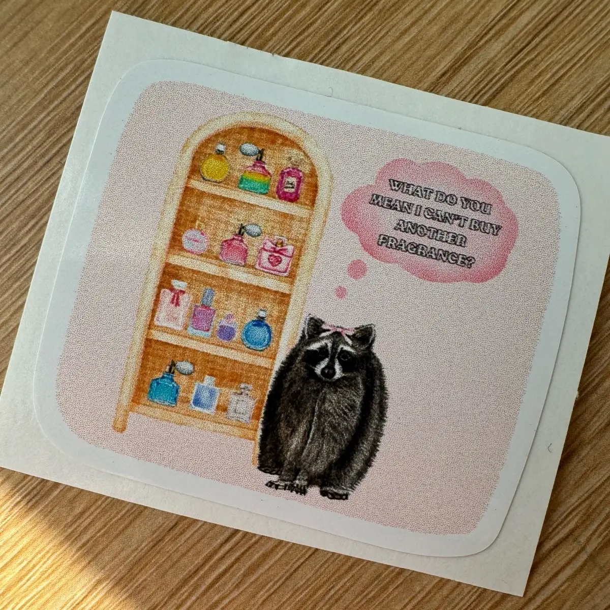 “What Do You Mean…” Quirky Raccoon Quote Fragrance Sticker