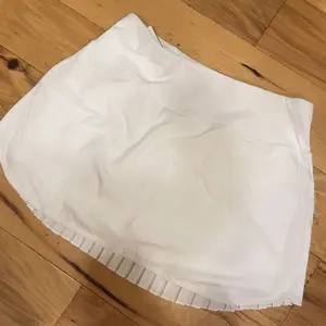 baleaf Women's Flowy Pleated Tennis Skirts Tummy Control with Pockets High Waisted Lightweight Golf Shorts Skirts with Shorts