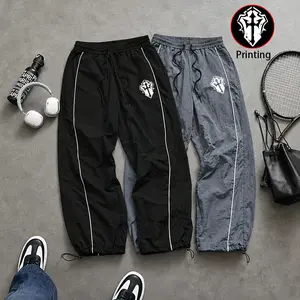 Unisex multi-pack parachute pants, athletic pants, side stripe cross print logo, drawstring joggers, casual street style, lightweight quick-dry, black/gray, for everyday fitness and running, elastic waistband, hip-hop skateboarding, breathable comfortable