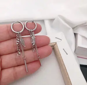 Feather pendent dangles surgical steel. kpop hypoallergenic steel earrings. hip hop dangle earrings. unisex chain earring.  fun earrings. Street wear earrings. Cool earrings.