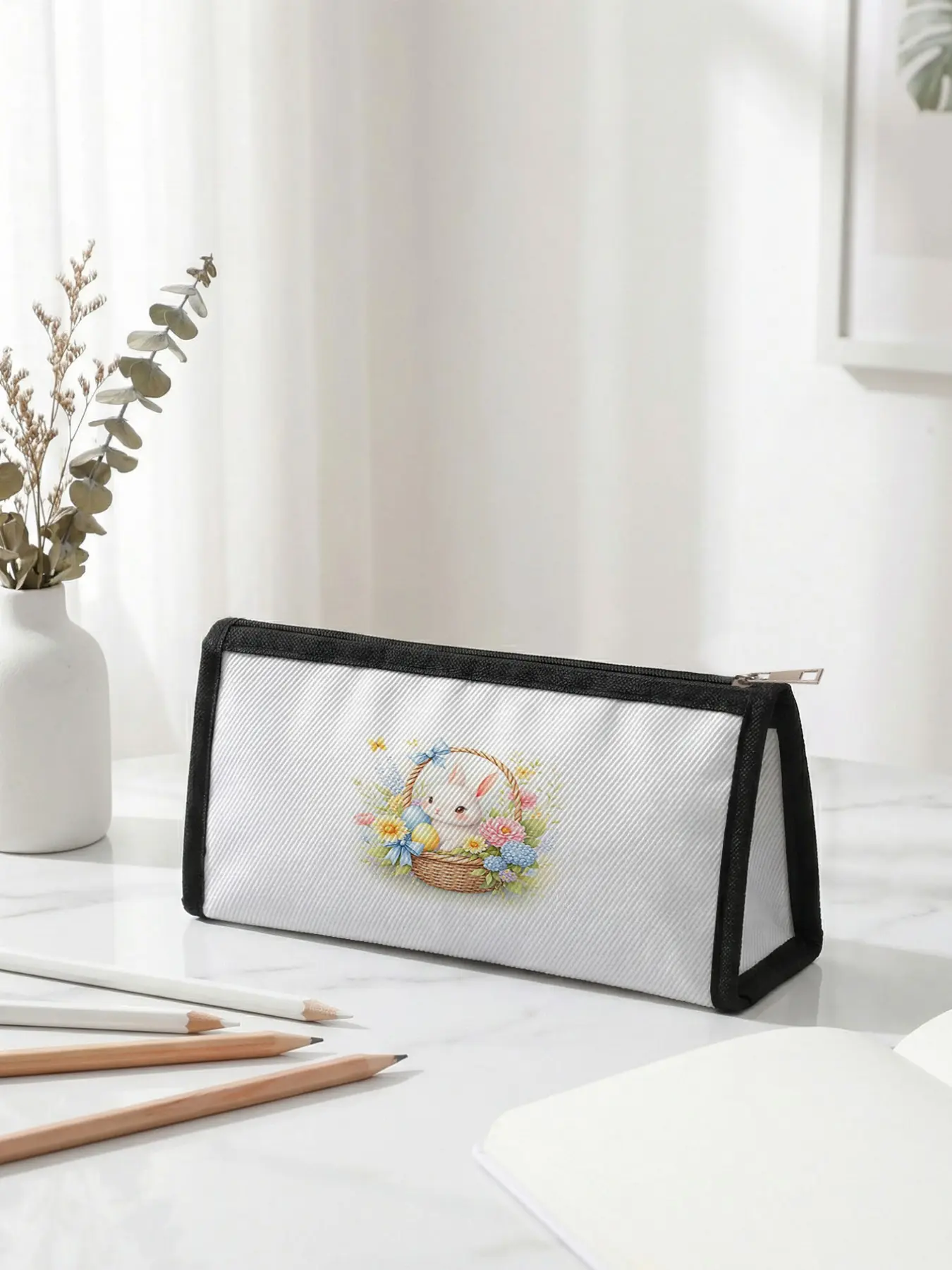 1 piece of Easter limited edition pencil case with 2D printed white rabbit in a basket design, ergonomic triangular capacity for portable size|Perfect for students in class/office organization, blending festive atmosphere with practicality