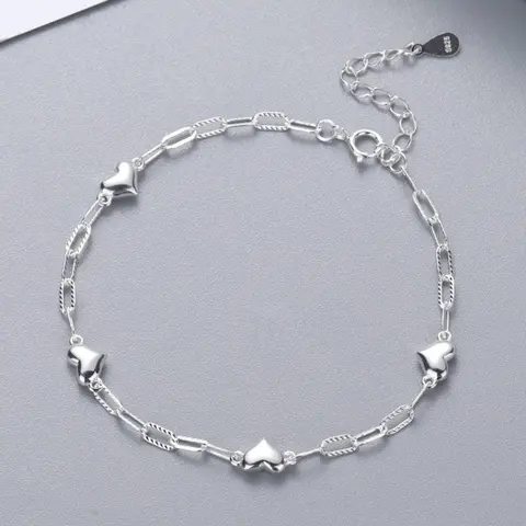 This S925 sterling silver bracelet features a simple heart design, making it a stylish and versatile accessory for women and girls, and a beautiful and unique birthday gift.