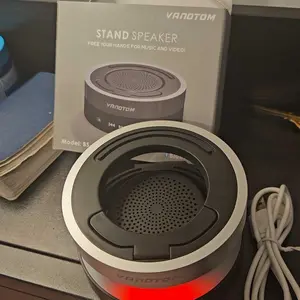VANOTOM 5-in-1 Wireless Speaker Phone Stand | BT Speaker, Power Bank, RGB Light | Foldable for All Phones