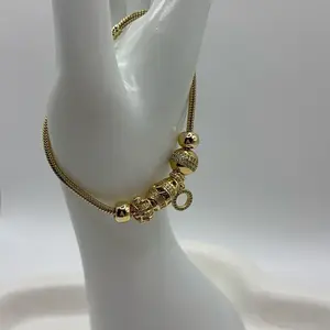 Gold-Tone Beaded Bracelet with Snake Chain Design for Women's Fashion Accessories Elegant and Stylish