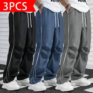 3-pack men’s casual long pants with side contrast stripes, elastic drawstring waist, drapey wide-leg fit, lightweight smooth quick-dry fabric, ruched design for a trendy, versatile look.