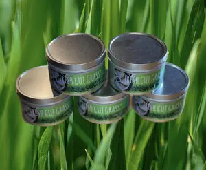 This is a custom scented candle that smells like Fresh Cut Grass. This candle is made with 100 % soy wax. The candle is 100% handmade, hand poured and made in the USA.