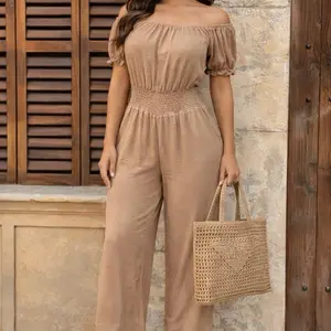 Enterizo estilo campesino tela tipo lino con bolsas a los lados y con fruncido elástico en la cintura y hombros