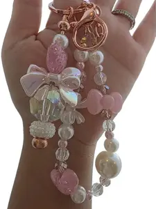 Kawaii Pink and Rose Gold Double Keychain with Bow and Beads - Unique Eye-Catching Design for Keys or Bag