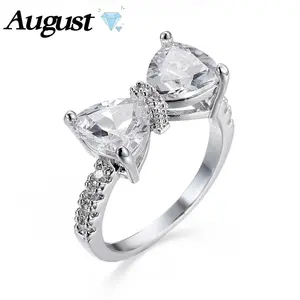 Colorful bow-knot cubic zirconia women's ring with a sweet, fresh and simple design. Promise of eternity. Wedding anniversary jewelry gift. Available in a variety of colors and sizes 5-12.