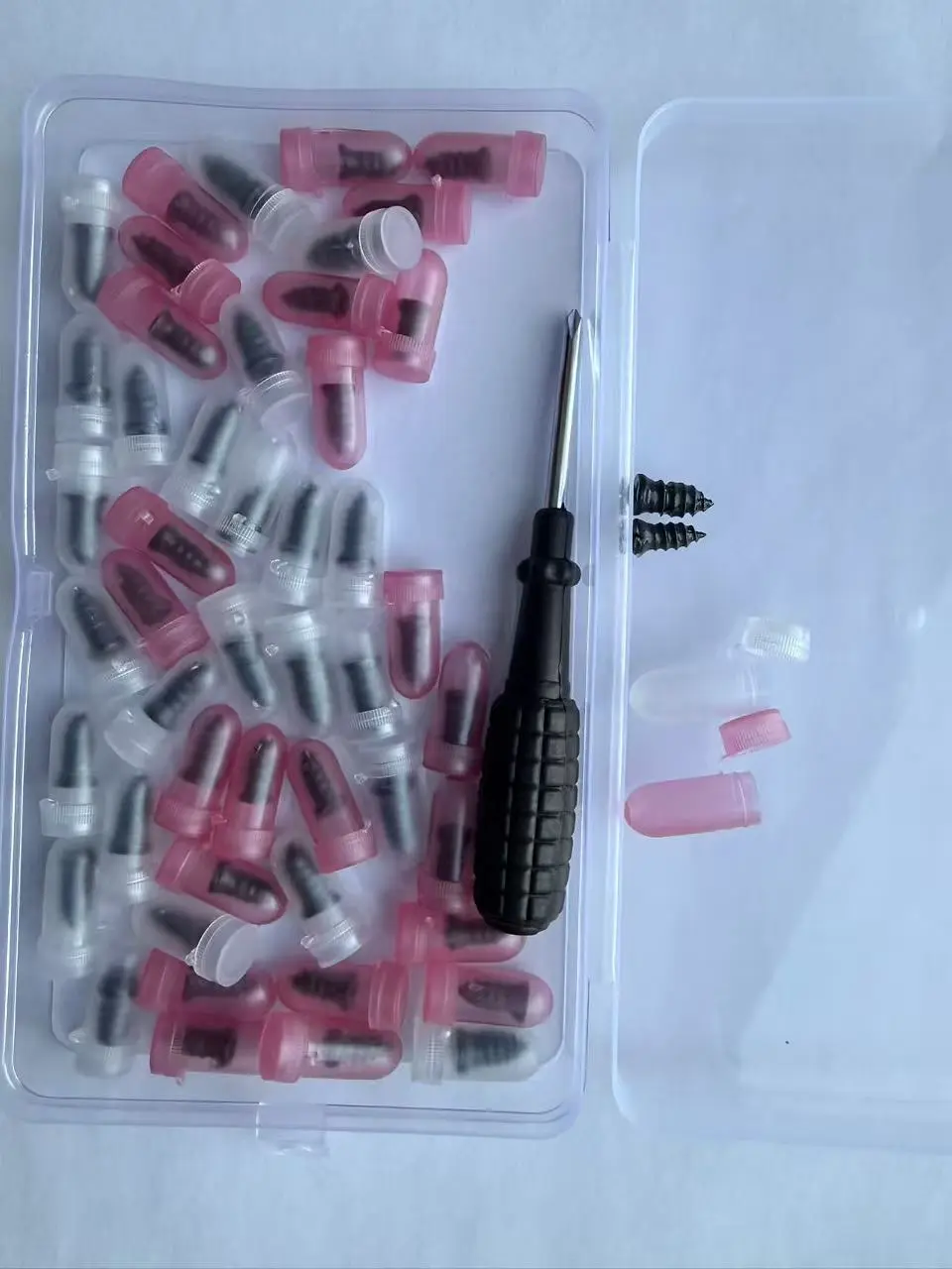 Pink Earplugs with Screwdriver and Storage Case for Noise Reduction and Comfort