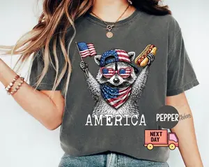 Comfort Colors America Raccoon Hot Dog Shirt, Kids 4th of July Raccoon Shirt, Patriotic American Flag Tee, Women's Retro USA Animal T-Shirt