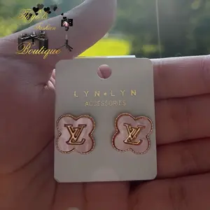 Lyn Lyn Accessories Pink Earrings from Fashion Boutique with LV Logo Design