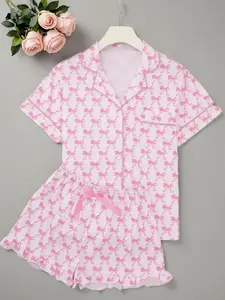 Women's All Over Bow Print Shortsleeve Lapel Shirt & Bow Decor Elastic Waist Shorts Pajama Two-piece Set, Casual Cute Comfy Button Front Pocket Top & Ruffle Hem Shorts Pj Set, Ladies Sleepwear for Summer, Pajama Sets Women, Loungewear, Cozy Lounge Set