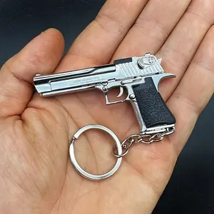1: Detachable B13 Gun-Shaped Alloy Sports Keychain with Two Small Bells, Perfect Decoration for Your Backpack
