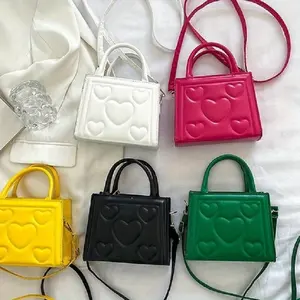 1pc Women’s Stylish Solid Color Handbag with Detachable Strap – Heart Pattern Design, Perfect for Valentine’s Day Gift, Available in Magenta, White, Black, Green, Yellow