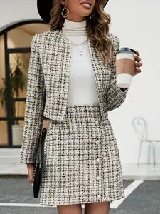 Two-piece women's peacock-pattern long-sleeved coat with pearl buttons and matching short skirt set, suitable for indoor and outdoor party wear