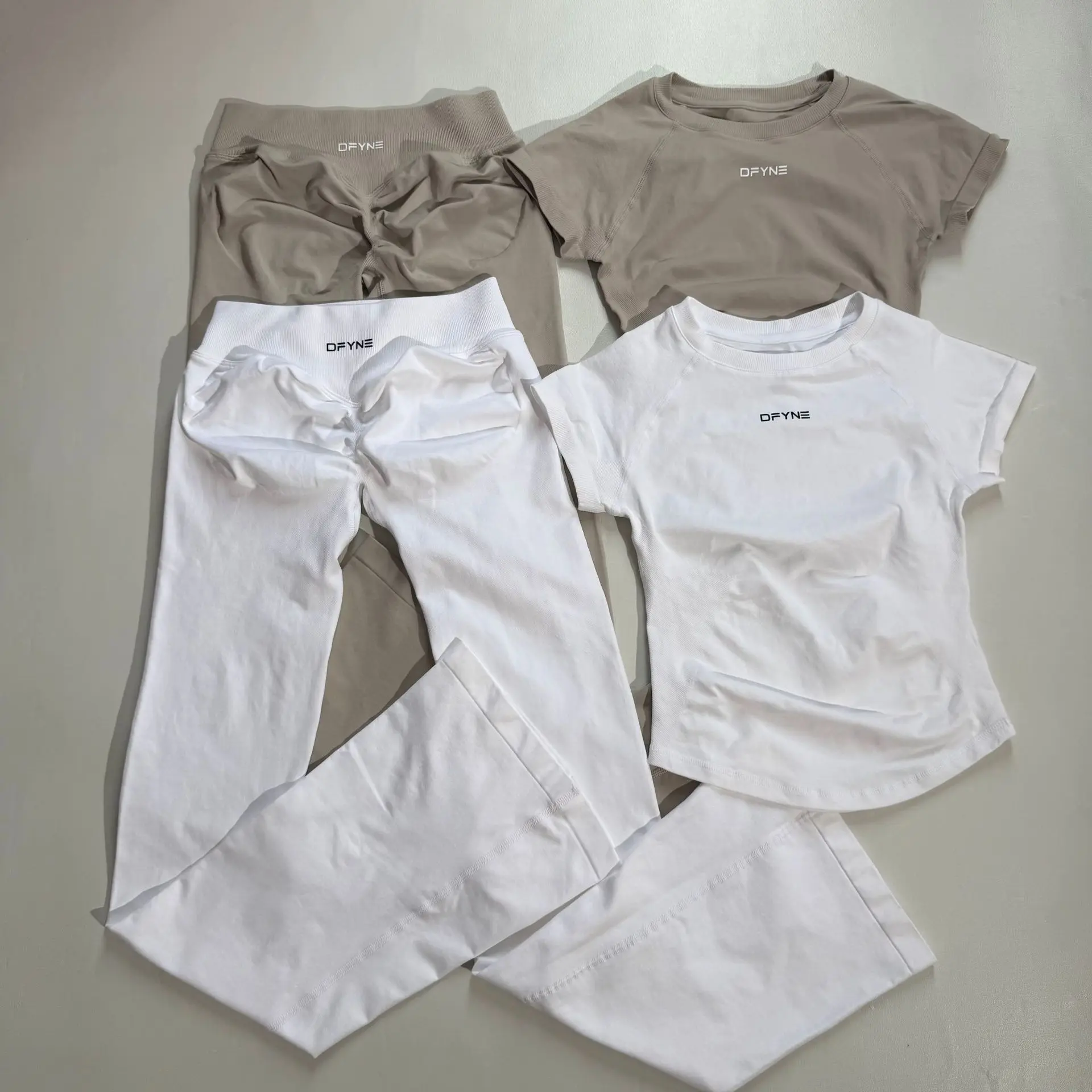 DFYNE Seamless Short Sleeve Crop Top & High Waist Scrunch Flare Pants 2 Piece Gym Set or Top Only