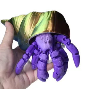large purple gradient hermit crab with a four color rainbow removabel shell figurine