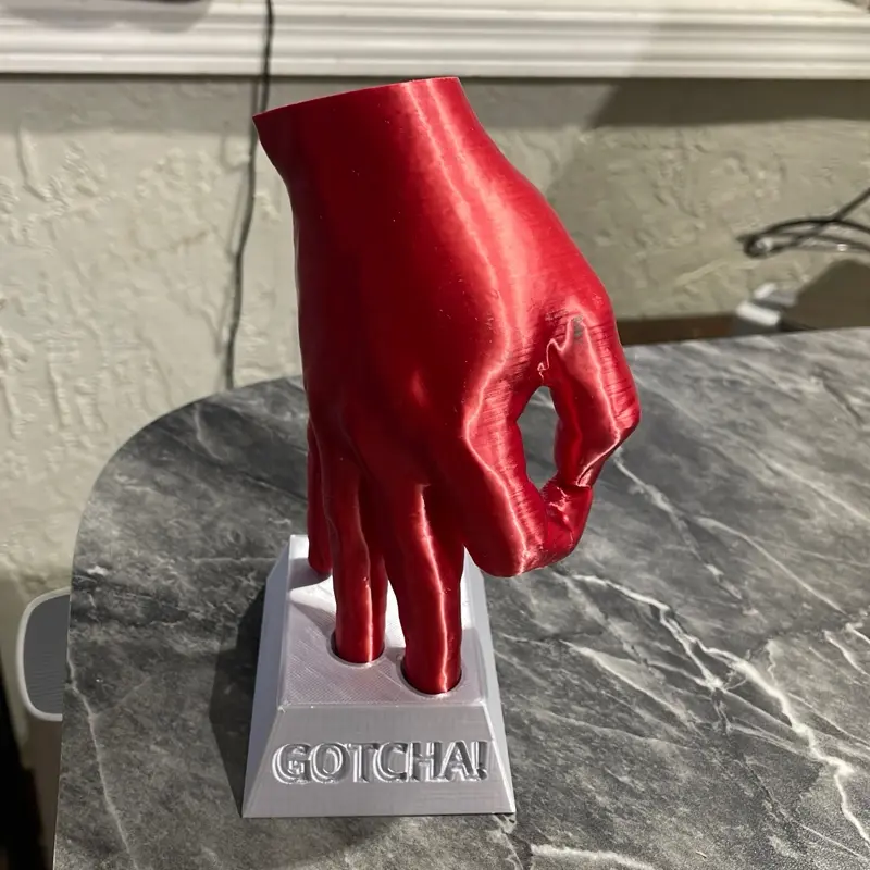 Gotcha Hand Meme Figurine 3D Printed – Silk Red Hand with Silver Base, Funny Desk Decor