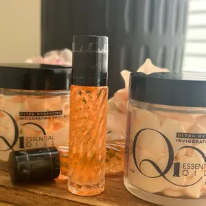 Qi Essential Oils shop logo