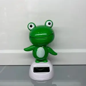 Car ornaments, solar-powered swinging frog car interior decoration, trending online