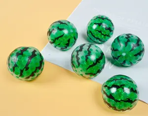 Watermelon-shaped stress-relief squeeze toy filled with colorful beads—a fun, novel, and squishy novelty item for stress relief.