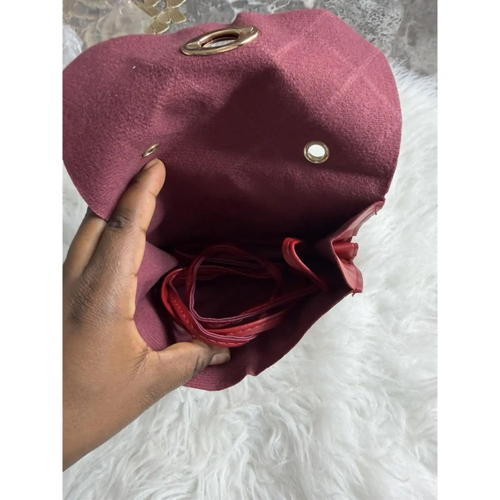 Elegant Burgundy Handbag with Gold Hardware and Red Lining