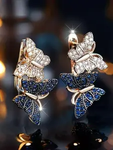 A Pair of Elegantly Styled Butterfly Hoop Earrings Perfect for a Fashionable Party.