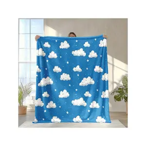 Dreamy Blue Blanket with Fluffy White Clouds and Twinkling Stars