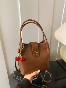 1pc Autumn/Winter HandbagFashionable, Minimalist, Casual, Vintage Solid Color Design Comes with an Exquisite Cherry Pendant Perfect for Daily Commutes, Shopping Trips, Dates, or Gifts A Must-Have for Every Woman