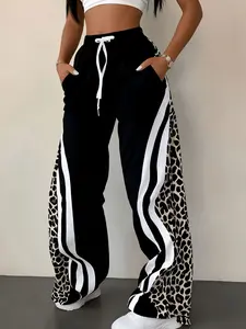 A women's fashionable new black leopard print white color-block striped drawstring waist pocket design sporty wide-leg pants, suitable for summer, daily wear, and sports outfits.