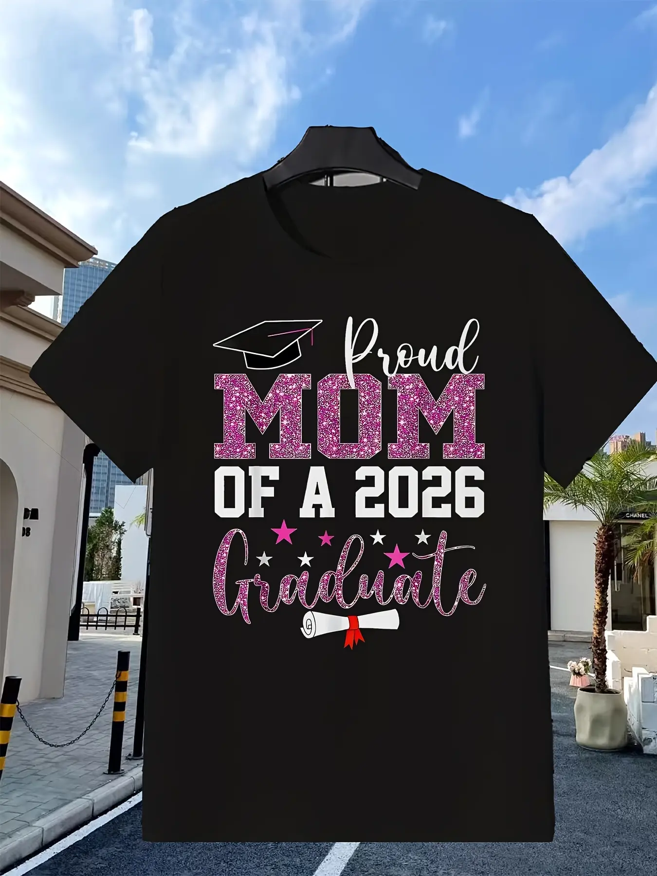 A Proud Mother of a Graduate from The Class of 2026, This Pink Glitter T-Shirt Features a Design with a Graduation Cap And Diploma, Perfect for Celebrating Graduation. It'S a Breathable Everyday Shirt Suitable for The Gym, Travel, Or Casual Wear