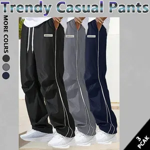 Men‘s Loose Sports Pants Men Trousers Grey Side Stripeswith Gold Accent Stripe Comfortable DesignAthleisure Style Bottoms Athletic Bottoms Gymwear streetwear fall outfits outfits men gym athletic clothes