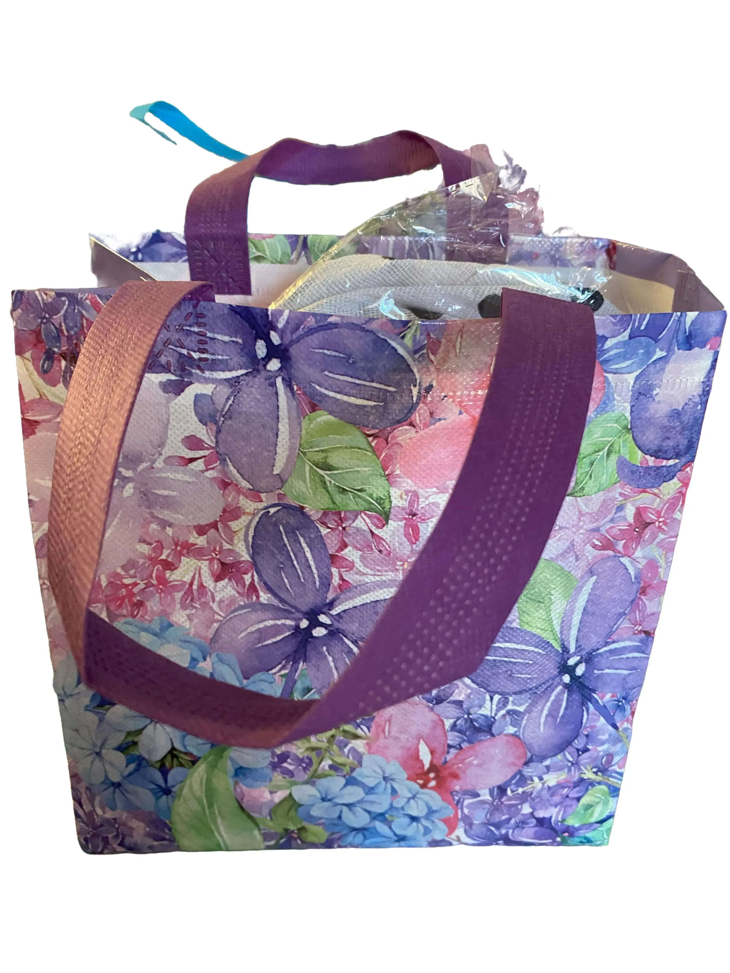 Happy Affirmations Goodie Bag with wax melts, car freshener, and free gifts to make you smile like plushies, bracelets, candy, eye masks, hug tokens and affirmation cards and stickers.