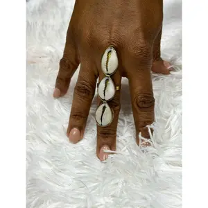 Kaure cowry Shell and brass statement ring