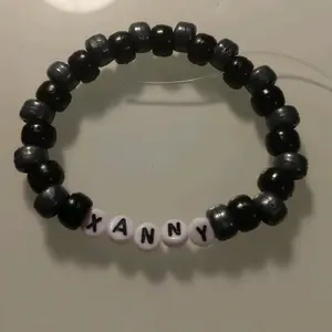 XANNY Beaded Bracelet with Black and White Beads, Adjustable Fit, Ideal for Everyday Wear
