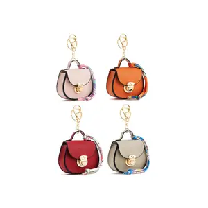 Women's 4PCS Saddle-Style Mini Bag Keychain, Waterproof PVC Coin Purse-Earphone Pouch-Lipstick Pouch with Snap Closure, Cute Bag Charm in Multiple Colors for Daily Use, Travel & Gifting