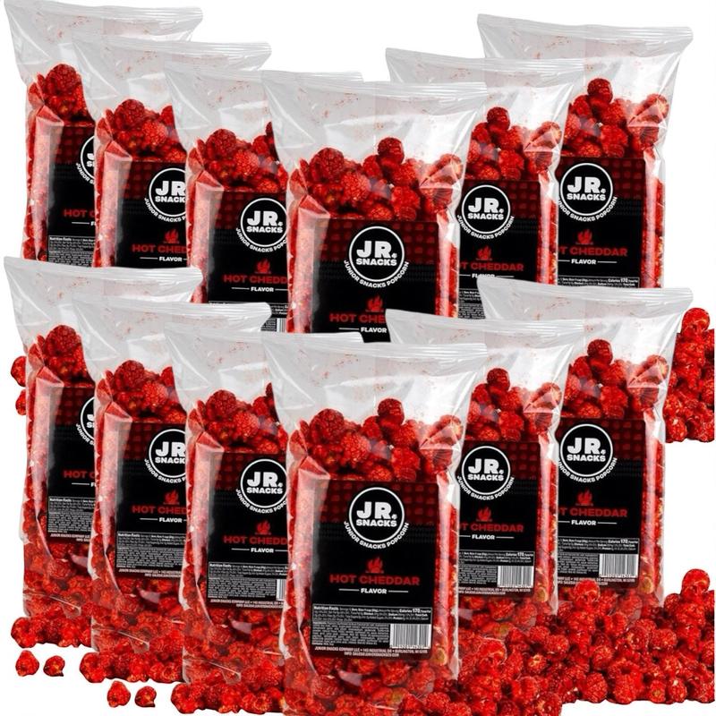 Junior Snacks Co. Hot Cheddar Popcorn; Yellow Cheddar meets our Spicy Red Seasoning