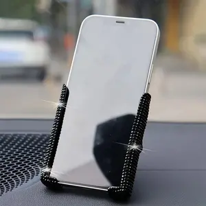 A new car mobile phone holder with artificial diamonds, cute dual-function trend navigation, trend car holder