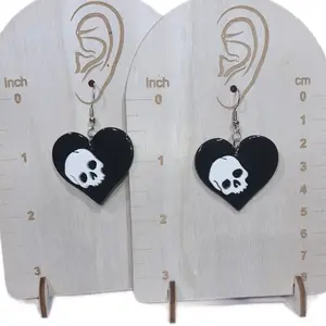 Black heart with skull earrings