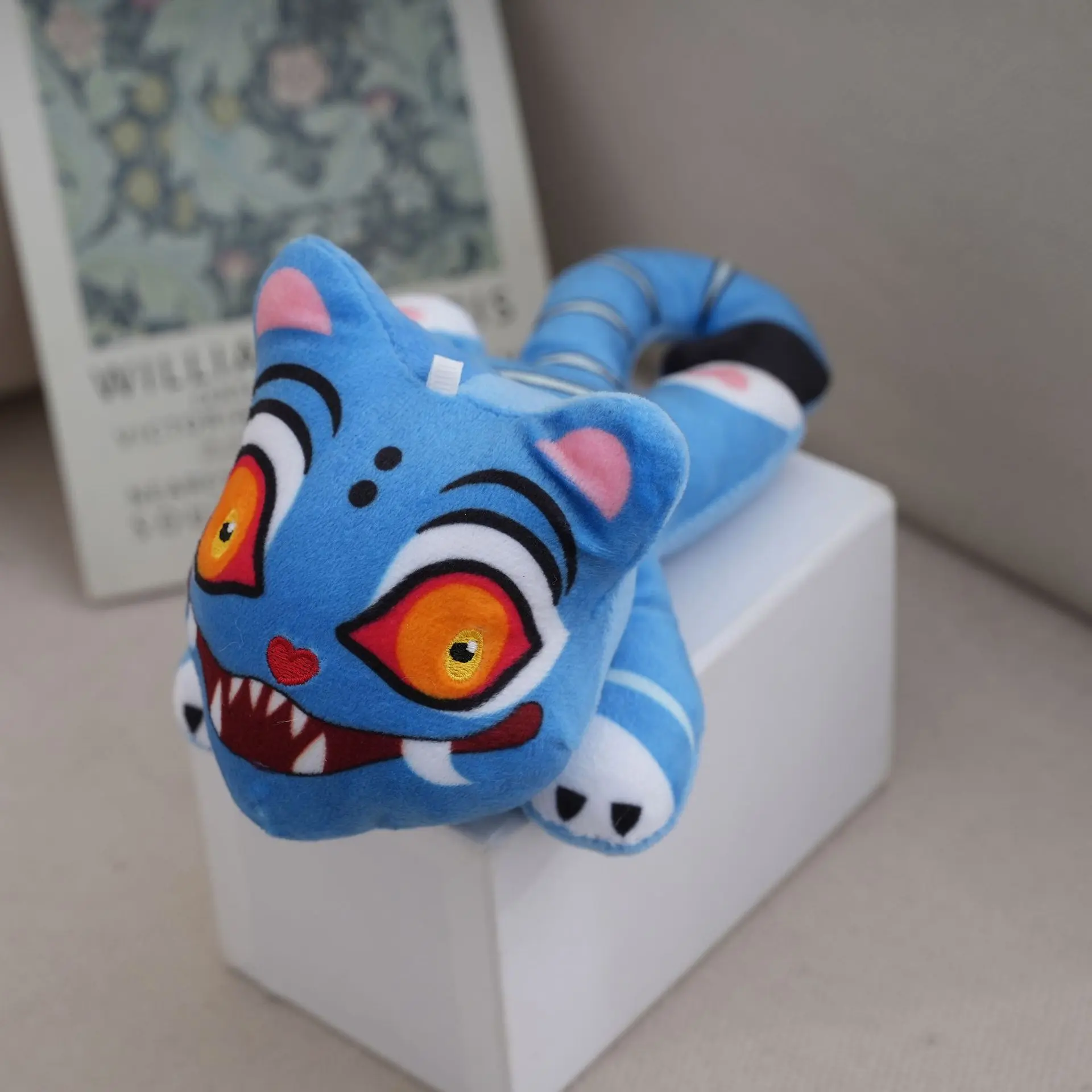 Lying on the tiger's pink tail