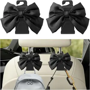 2 count  Seat Headrest Hook, Cute Bow  Seat Hanger Storage Hooks for Handbag Purse Coat, Automotive Interior Headrest Organizer, Universal for Automobile RV  (Black)