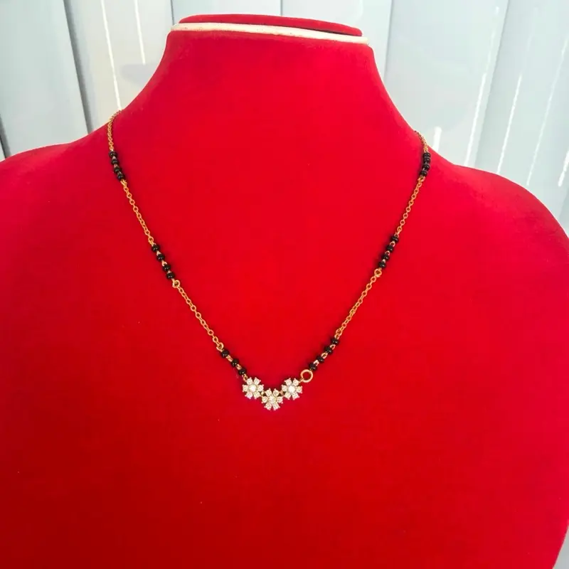 Gold plated daily use Nepali  Mangalsutra with black potey and multiple stone work on it.