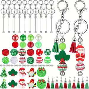 70 piece Christmas themed bead keychain set, including 10 keychains, 20 spacer beads, 20 spacer pieces, 10 Christmas themed beads, and 10 tassel DIY handmade Christmas party gifts