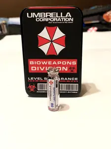 Resident Evil 4 Las Plagas Parasite Vial - 1.5in Mini Replica - Metal Storage Tin Included