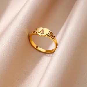 An Elegant and Fashionable Golden Stainless Steel English Letter Ring, Perfect Gift for Women, Suitable for Daily, Holiday, and Party Decoration, Design with Twenty-Six English Letters