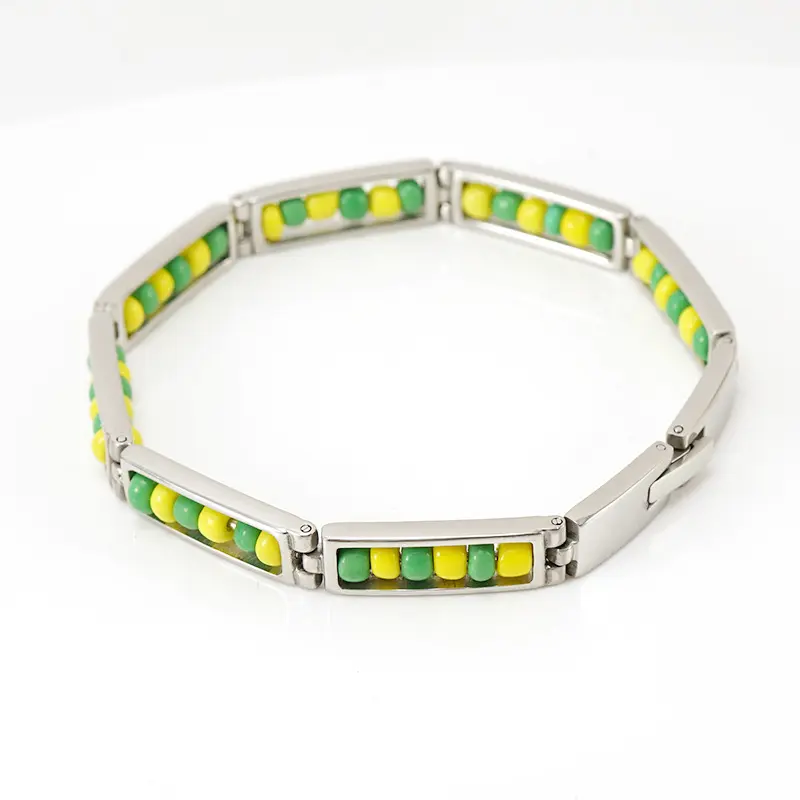 Steel colored bracelet   yellow+green