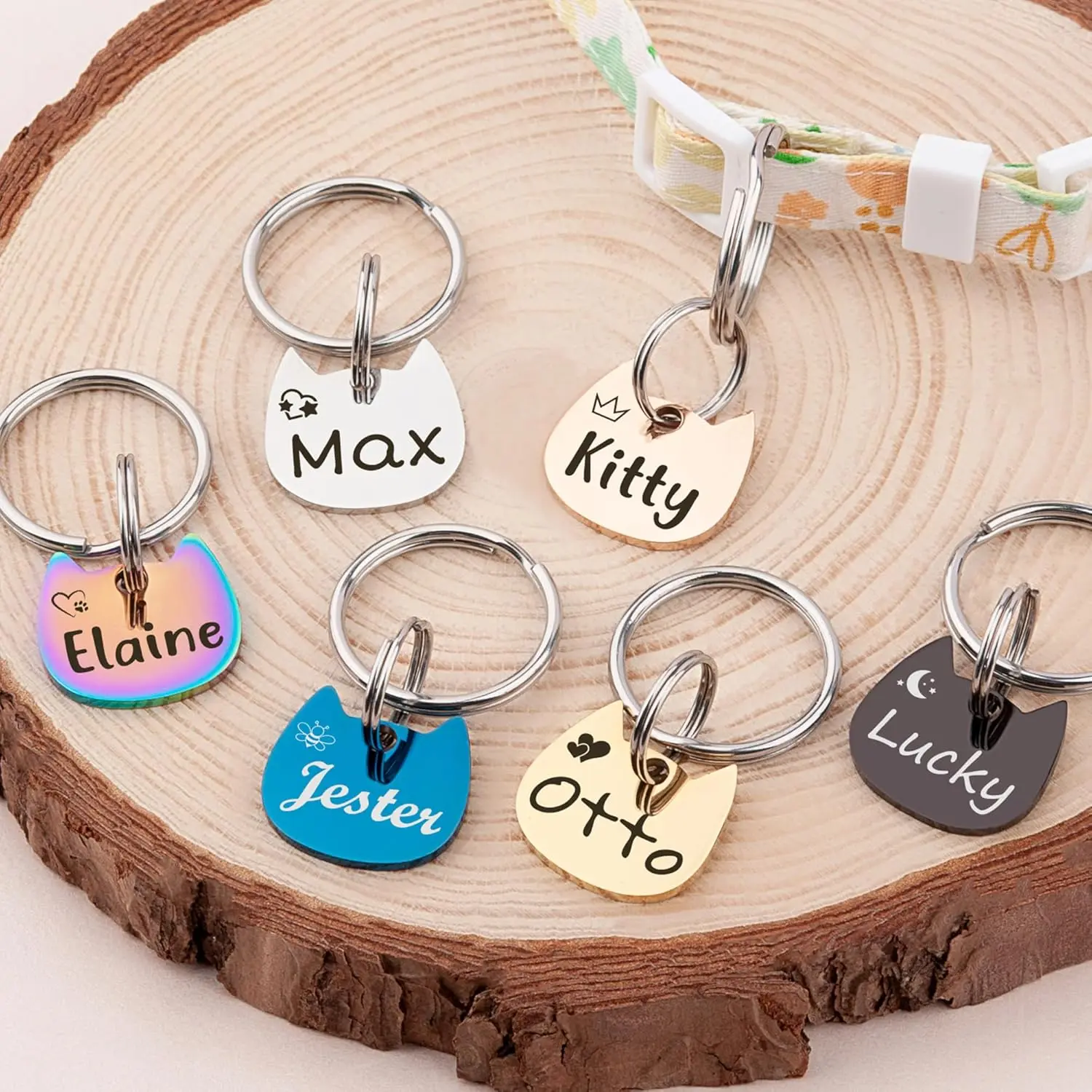 Customizable pet ID tag; features name and phone number; made of metal with laser engraving; rust-proof and fade-resistant; helps prevent pets from getting lost.