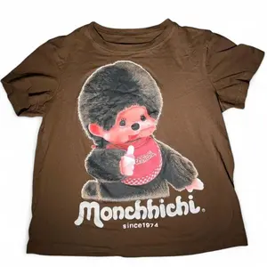 Monchhichi Classic Character Graphic T-Shirt (Since 1974) - Vintage Graphic Tee – Unisex S-3XL – Menswear & Womenswear – Streetwear Tops – Casual Cotton Crewneck Shortsleeve T-shirt