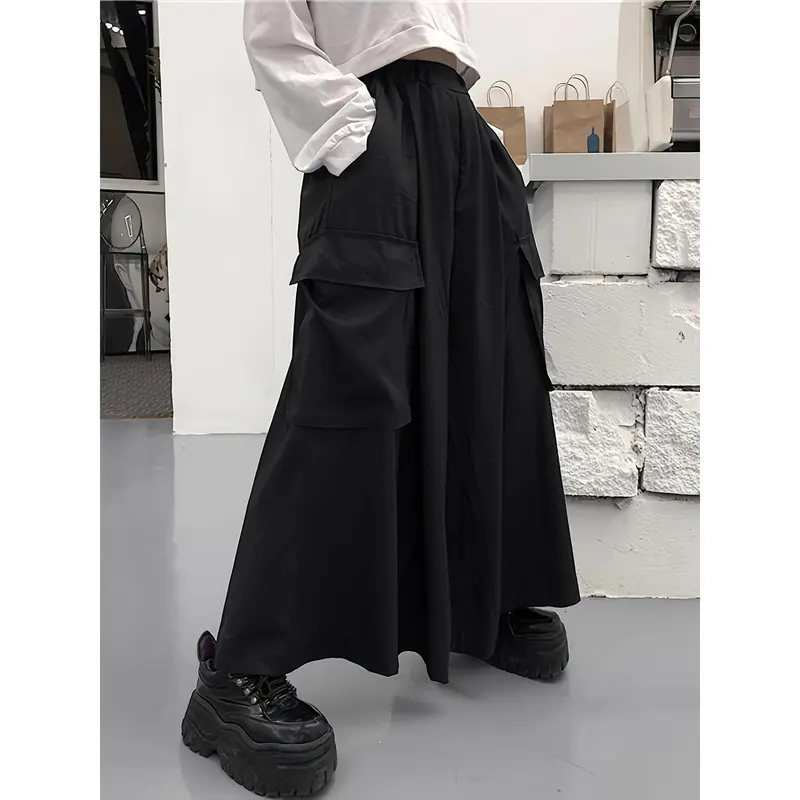 New Korean trendy dark style oversized cargo pants with large pockets and wide legs, designed with a fluid, culotte-like silhouette.
